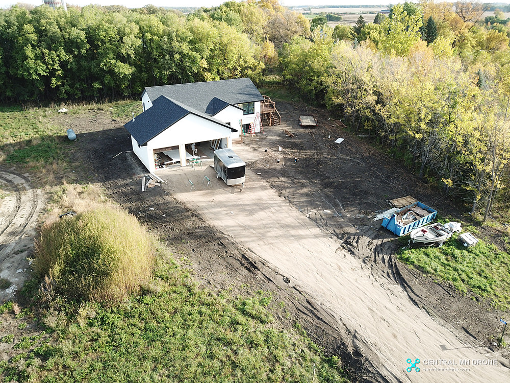 Drone photo of a new lake home and driveway in the Alexandria Minnesota lakes area